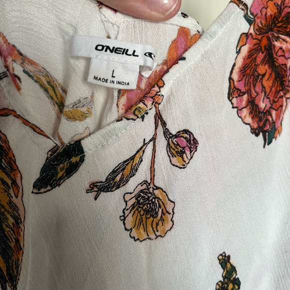 Floral tank top with spaghetti straps with ties at top. Size Large. Flowy/Light. - Picture 4 of 4